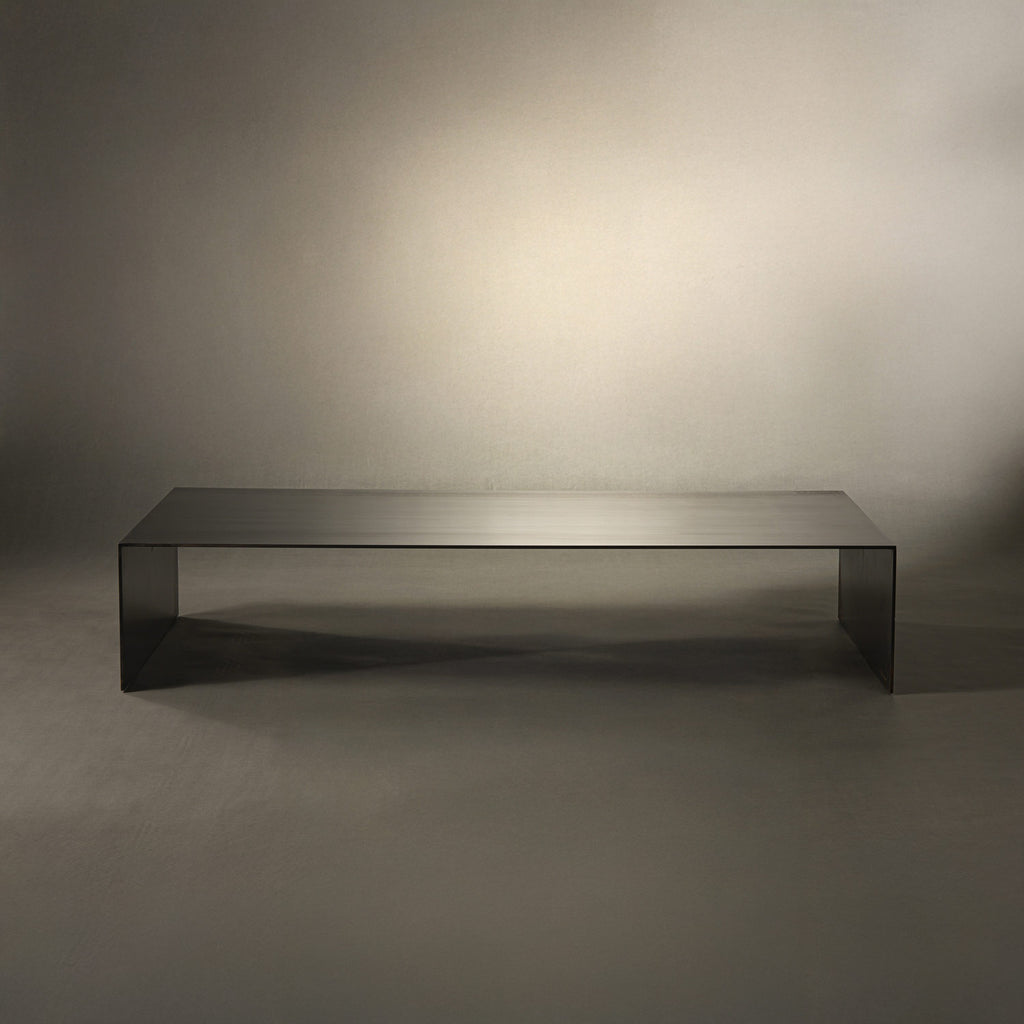 Modern black coffee table on a gray background