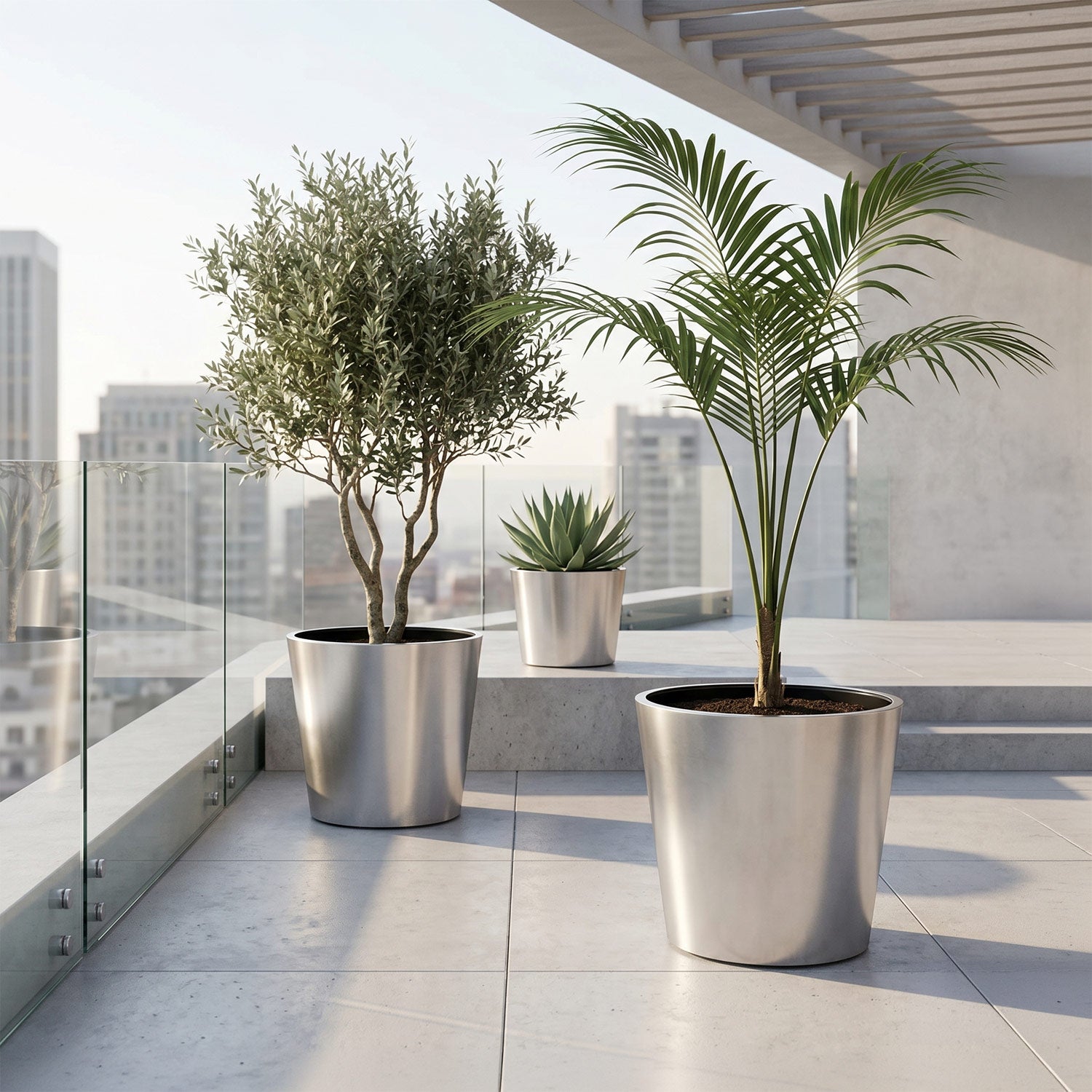 The Stainless Statement · 3 Piece Stainless Steel Planter Set