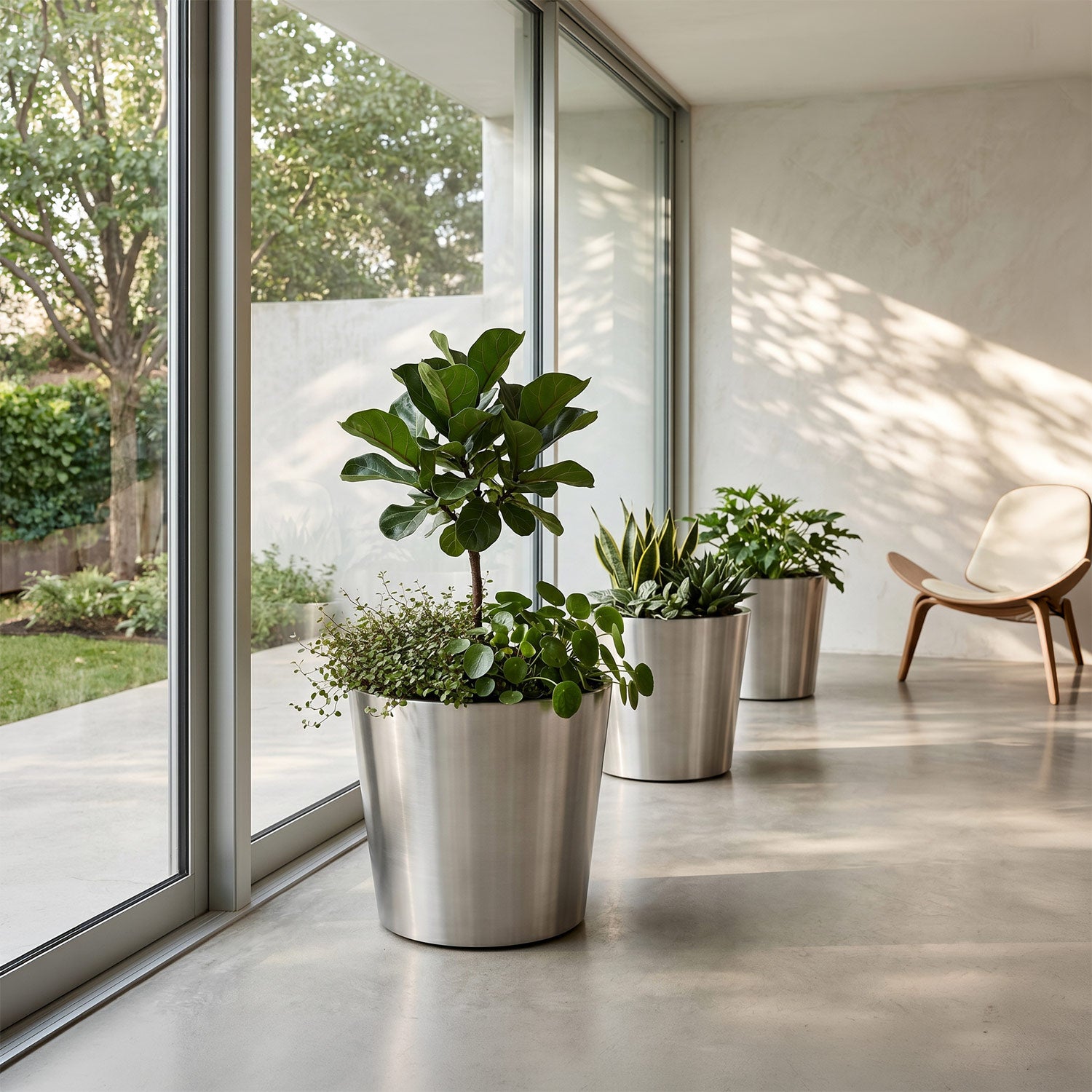 The Stainless Trio · 3 Piece Stainless Steel Planter Set